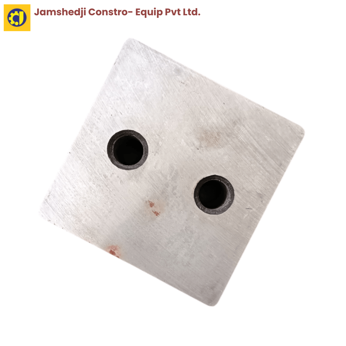 Top view of a metallic block with two holes, ideal for construction and engineering applications.