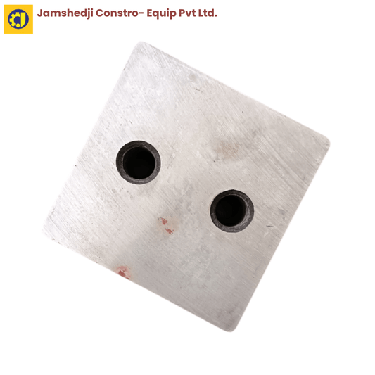 Top view of a metallic block with two holes, ideal for construction and engineering applications.